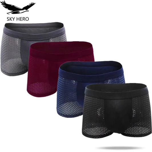 Four pairs of men's underwear in gray, red, blue, and black on a white background with 'SKY HERO' branding.