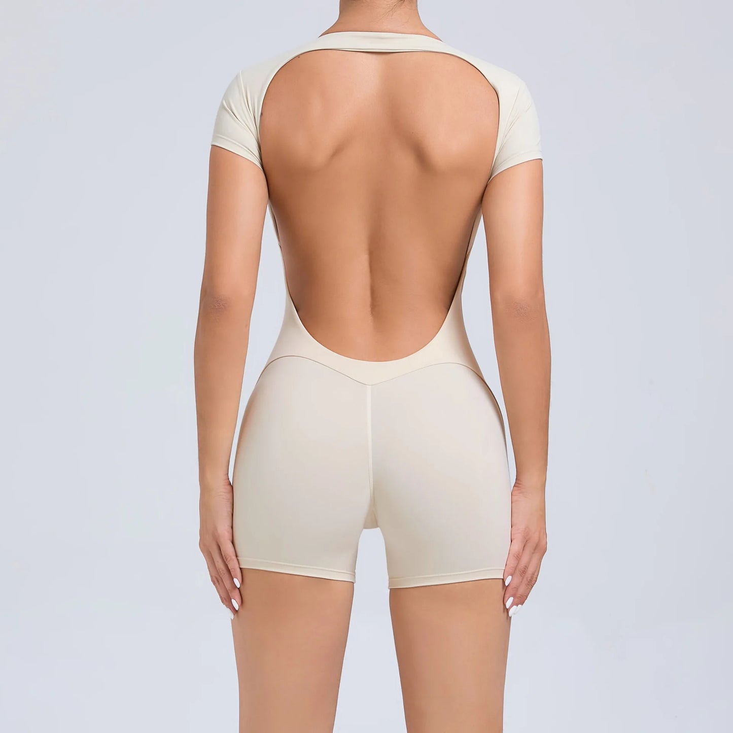 Women's Padded Short Sleeve One-Piece Jumpsuit - Quick-Dry, Backless Sports Suit for Active Fitness