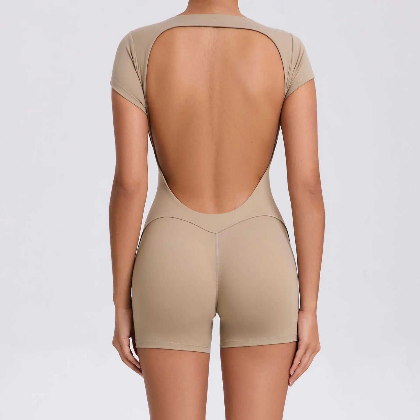Women's Padded Short Sleeve One-Piece Jumpsuit - Quick-Dry, Backless Sports Suit for Active Fitness