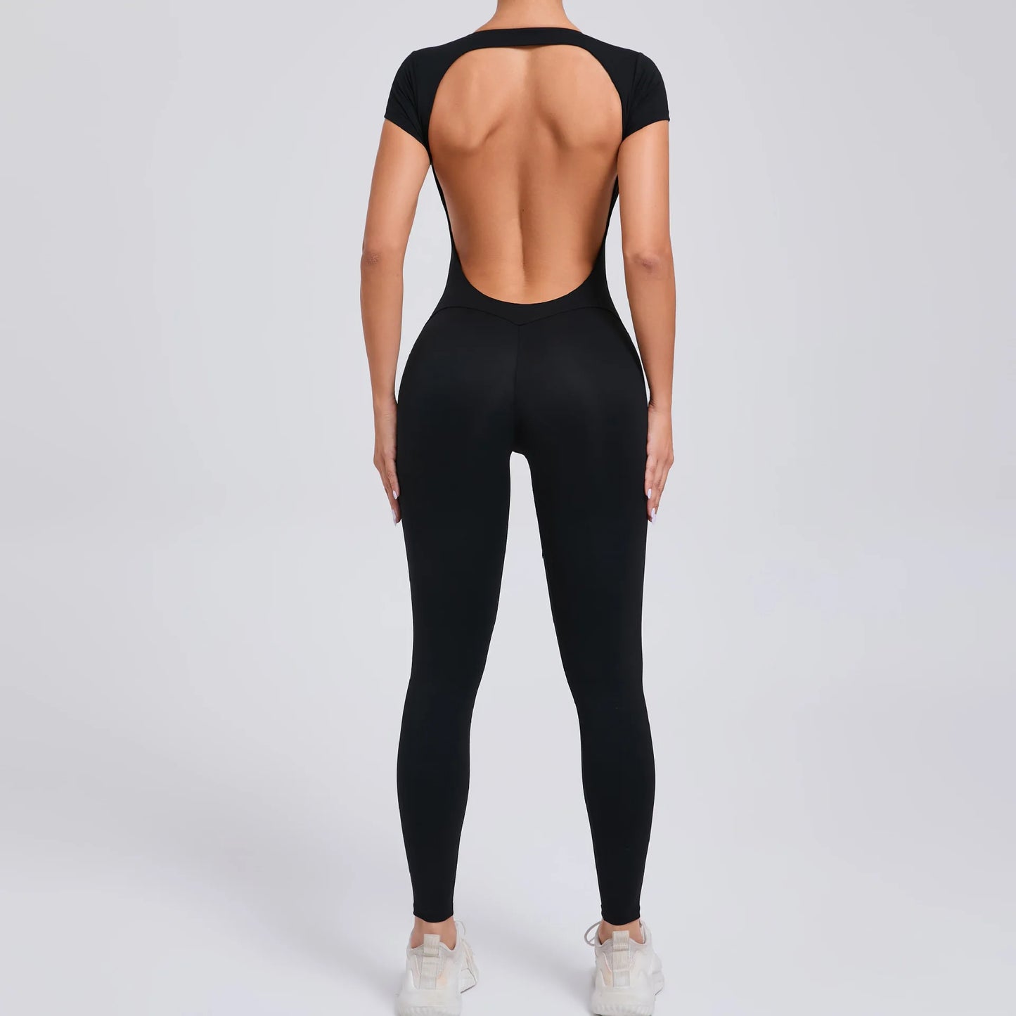 Women's Padded Short Sleeve One-Piece Jumpsuit - Quick-Dry, Backless Sports Suit for Active Fitness