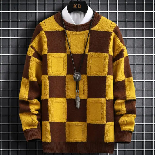Brown and yellow checkered sweater on a hanger against a tiled wall background