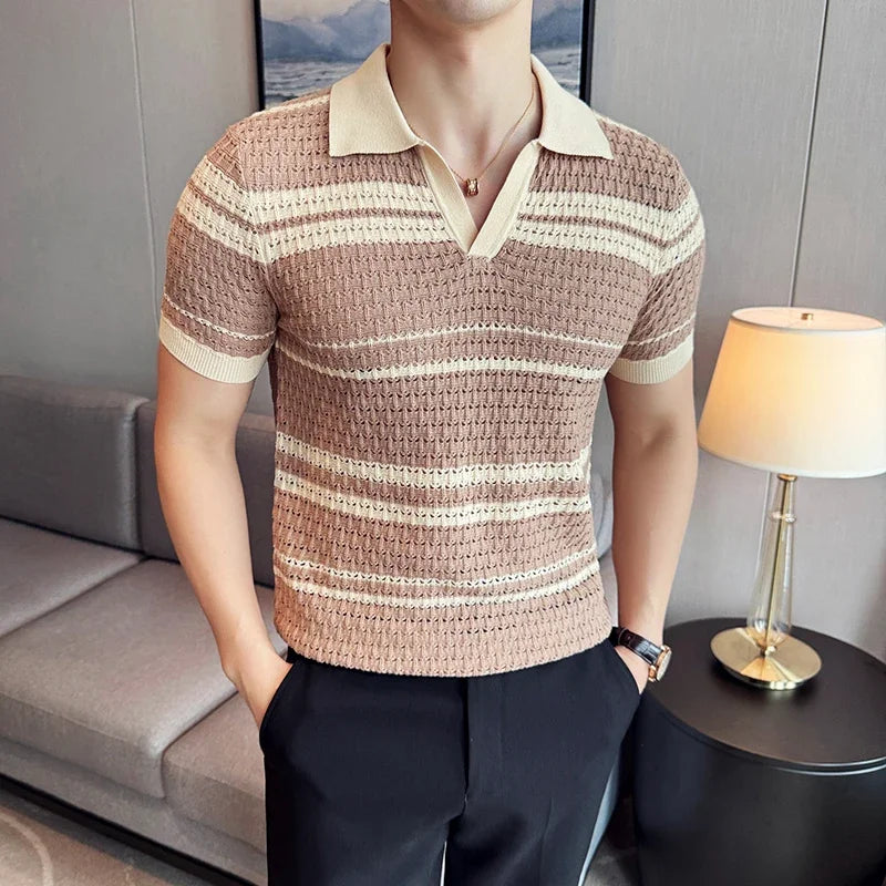 Man wearing a brown and beige striped polo shirt in a living room setting.