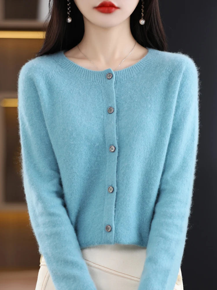 Light blue cardigan worn by a person with a blurred background