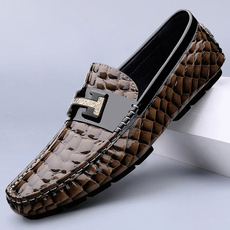Brown woven loafer with a decorative buckle on a light gray background