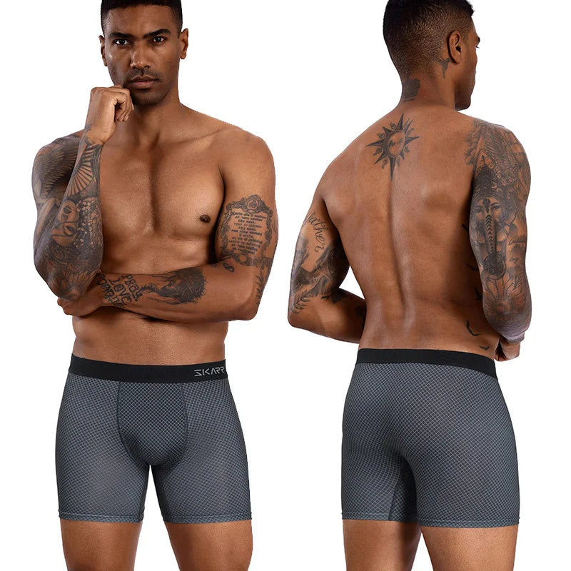 Man wearing gray boxer briefs with a brand logo, shown from front and back.