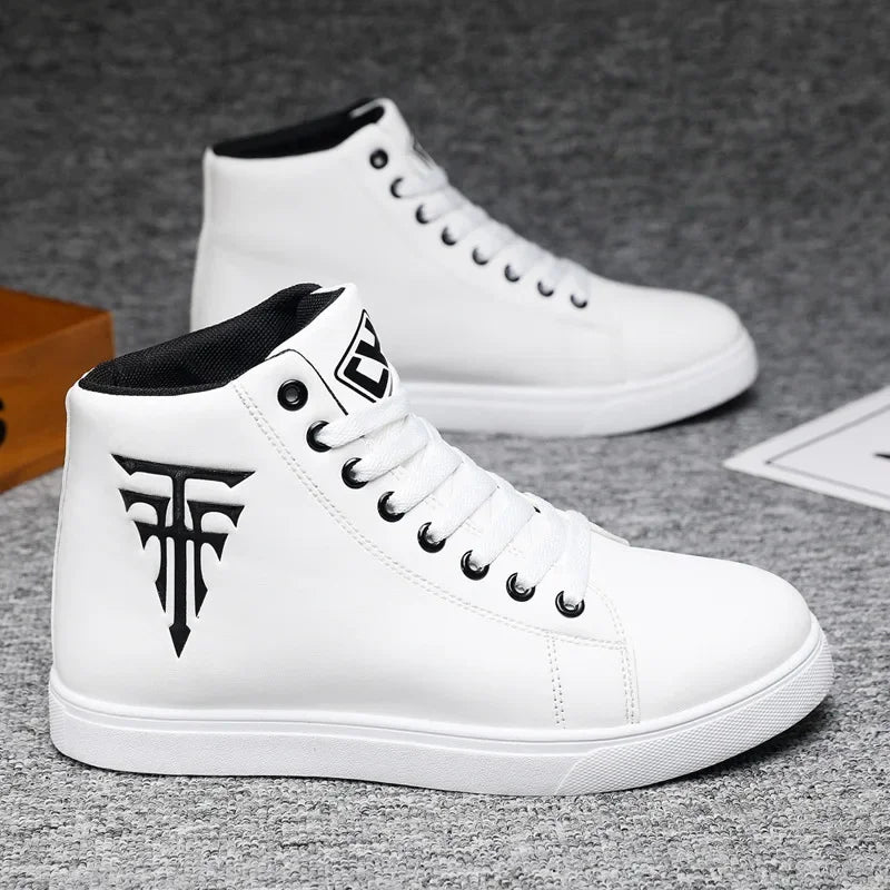 White high-top sneakers with a black logo on a gray surface