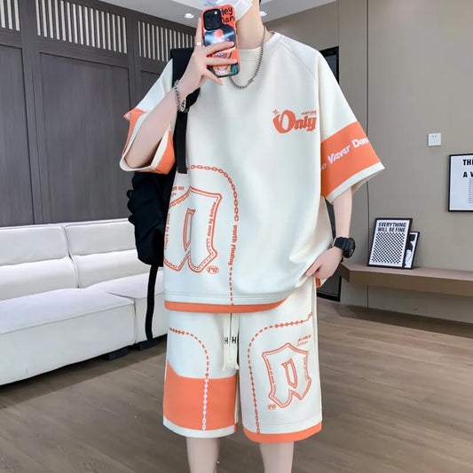 Person wearing a matching outfit with 'Only' branding in a room with a couch and framed pictures.