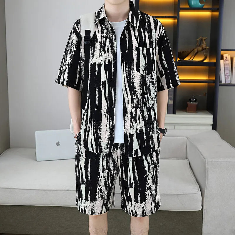 Person wearing a black and white patterned outfit in a living room setting.