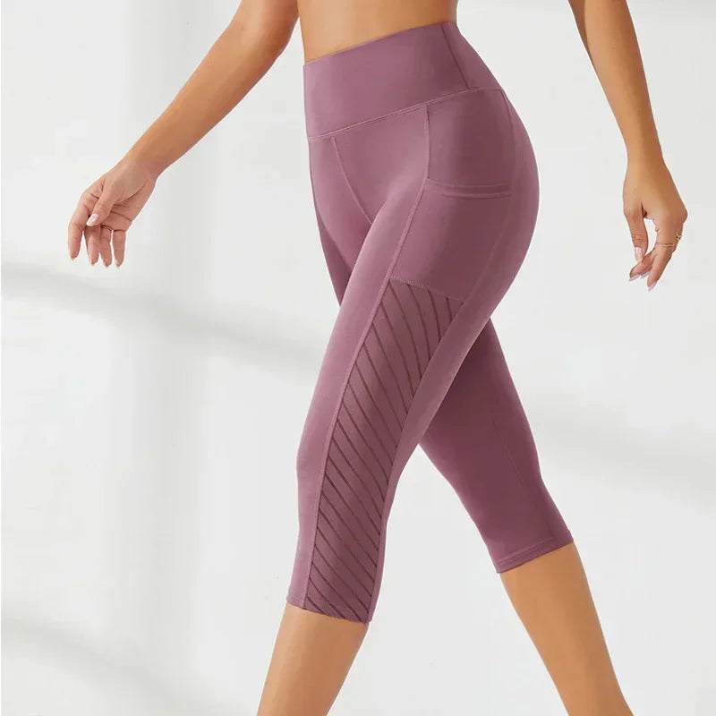 High-Waisted Hip-Lifting Slimming Yoga Crop Pants with Panel Pocket Design