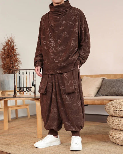 Person wearing a brown floral patterned outfit in a living room setting.