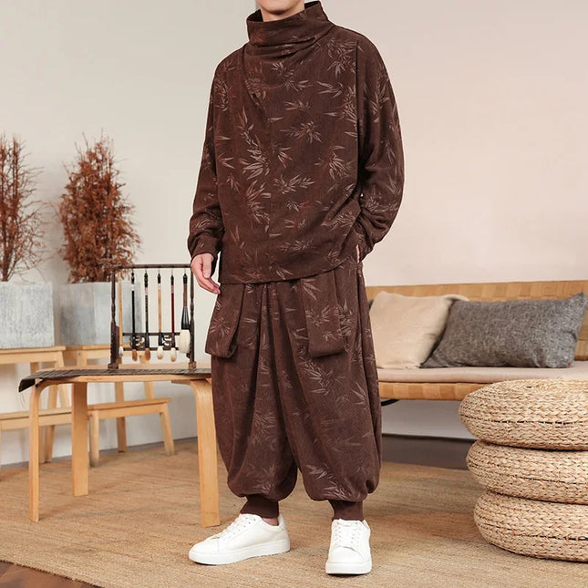 Person wearing a brown floral patterned outfit in a living room setting.