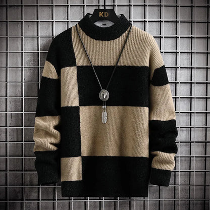 Beige and black checkered sweater with a necklace on a grid background
