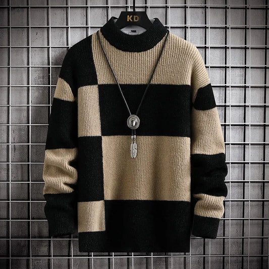 Beige and black checkered sweater with a necklace on a grid background