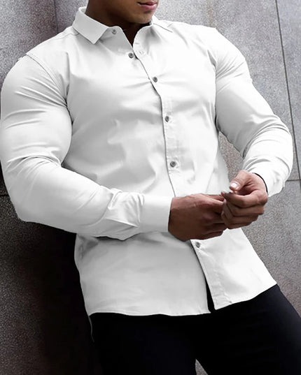 Person wearing a white dress shirt against a gray wall