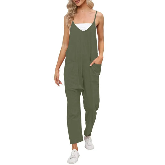 Woman wearing a green jumpsuit on a white background