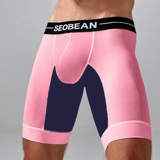 Pink compression shorts with black waistband featuring 'SEOBEBAN' brand on a gray background