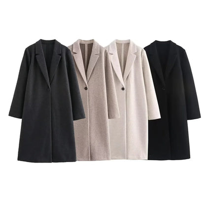 Four different styles of coats on a white background