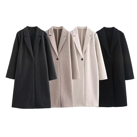 Four different styles of coats on a white background