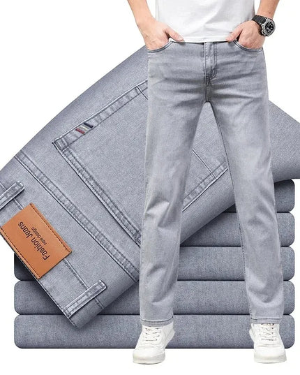 Stack of light gray jeans with a person wearing one, on a white background