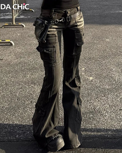Person wearing flared jeans and black shoes on a street with 'REDDA CHIC' branding.