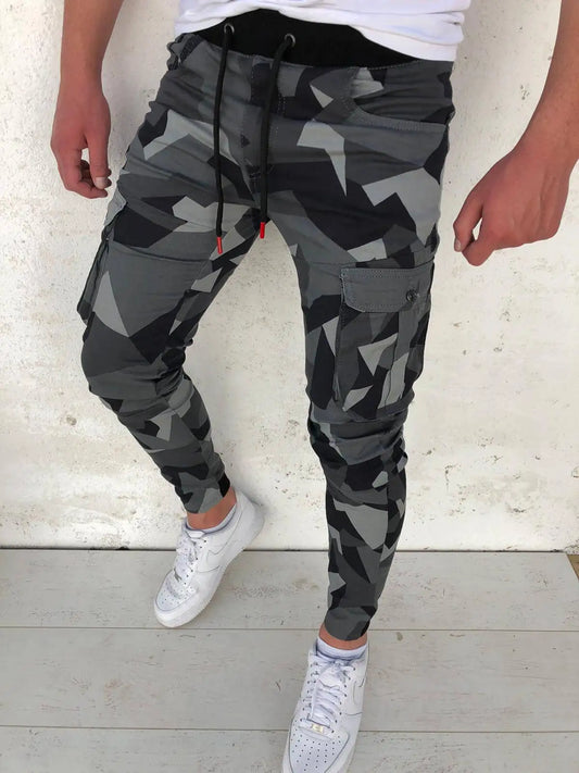 Camouflage pants worn by a person on a light background