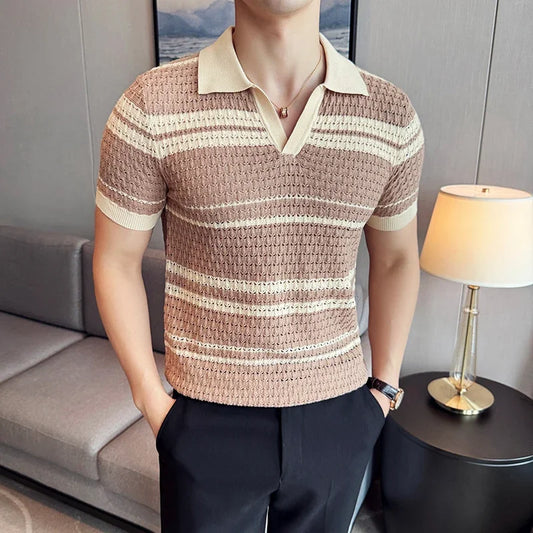Man wearing a brown and beige striped polo shirt in a living room setting.