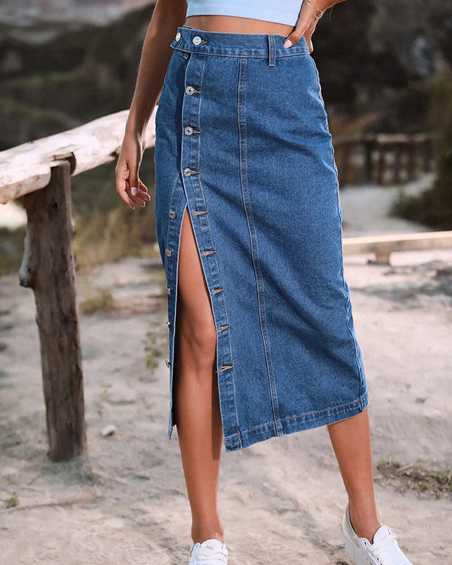 Person wearing a blue denim skirt with a blurred natural background