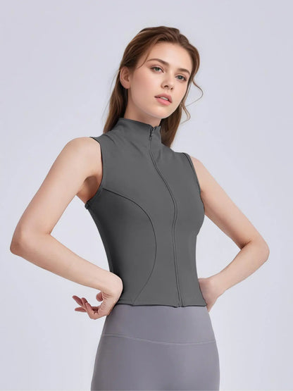 Women's Sleeveless Sports Vest with Thumb Hole Design and Zip-Up Closure