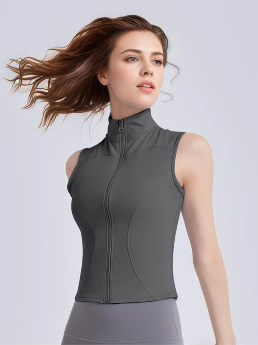 Women's Sleeveless Sports Vest with Thumb Hole Design and Zip-Up Closure