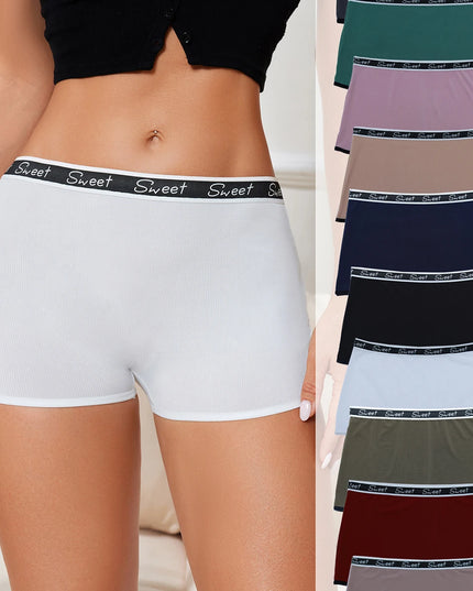 White boxer briefs with 'Sweet' waistband worn by a person, followed by a display of various colored boxer briefs.