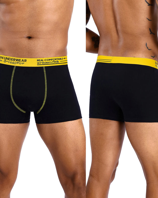 Black boxer briefs with yellow waistband on a white background