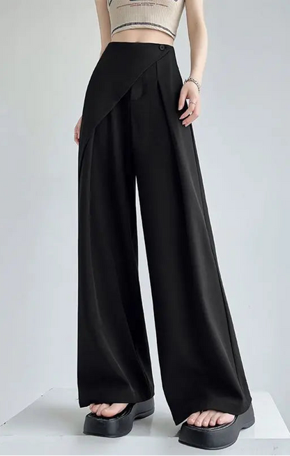 Black wide-leg pants worn by a person on a plain background with text in Chinese.