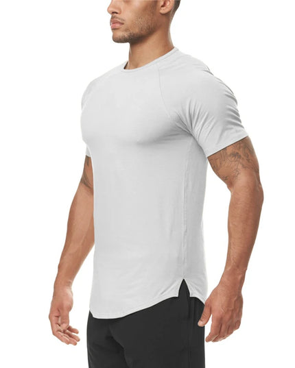 Man wearing a white athletic t-shirt on a white background