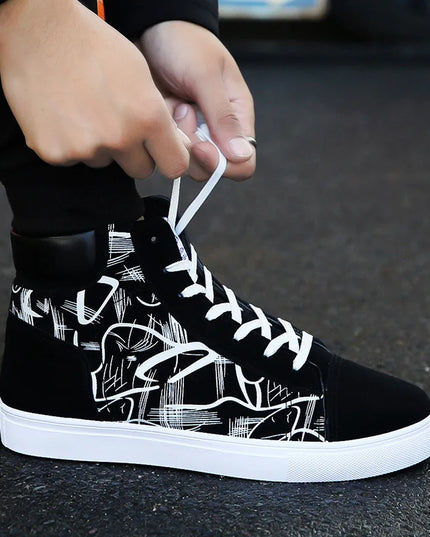 Black high-top sneakers with white abstract design on a dark surface