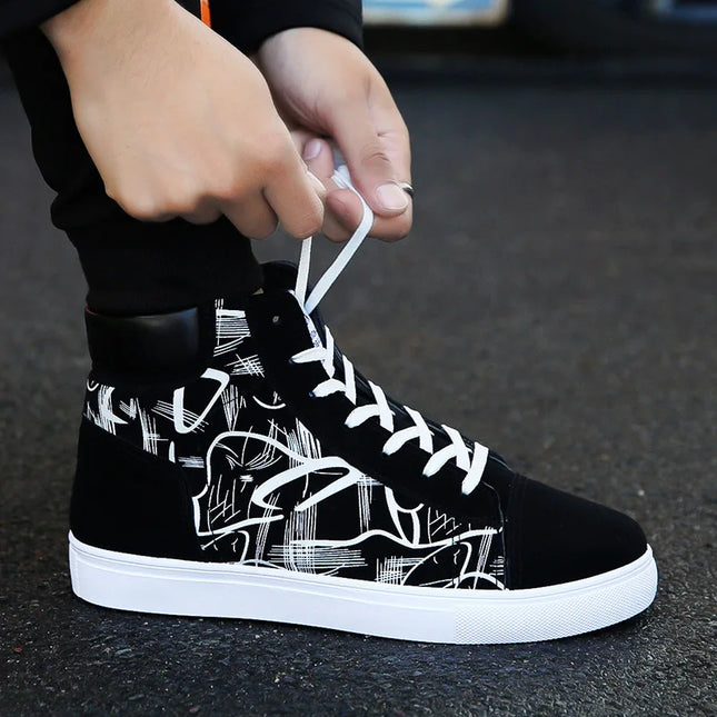 Black high-top sneakers with white abstract design on a dark surface