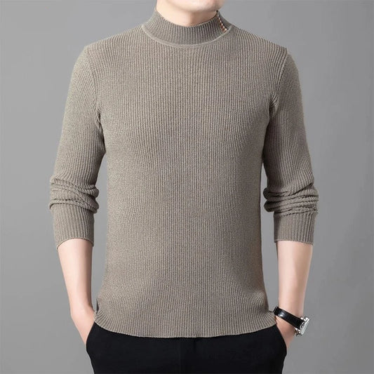 Brown ribbed sweater worn by a person on a gray background
