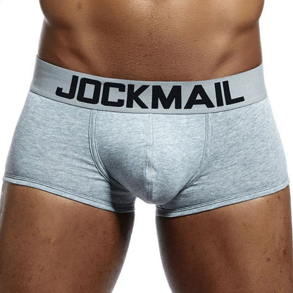 Gray boxer briefs with 'Jockmail' waistband on a white background
