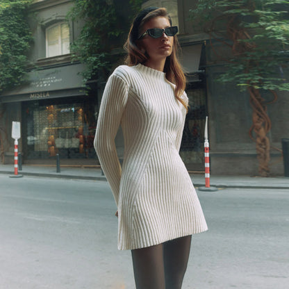 Please note the following size chart, which includes an elastic feature:

Size S:

Bust: 64 cm
Waist: 56 cm
Hip: 78 cm
Sleeve Length: 59 cm
Overall Length: 83 cm
Size M:

Bust: 68 cm
Waist: 60 cm
Hip: 82 cm
Sleeve Length: 60 cm
Overall Length: 84 cm
Size L:

Bust: 72 cm
Waist: 64 cm
Hip: 86 cm
Sleeve Length: 61 cm
Overall Length: 85 cm