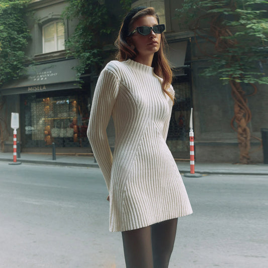 Please note the following size chart, which includes an elastic feature:

Size S:

Bust: 64 cm
Waist: 56 cm
Hip: 78 cm
Sleeve Length: 59 cm
Overall Length: 83 cm
Size M:

Bust: 68 cm
Waist: 60 cm
Hip: 82 cm
Sleeve Length: 60 cm
Overall Length: 84 cm
Size L:

Bust: 72 cm
Waist: 64 cm
Hip: 86 cm
Sleeve Length: 61 cm
Overall Length: 85 cm