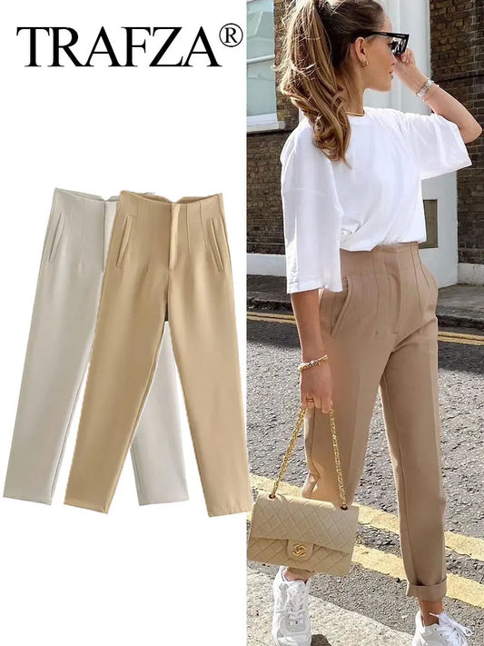 Trafza pants displayed with a model wearing them outdoors.