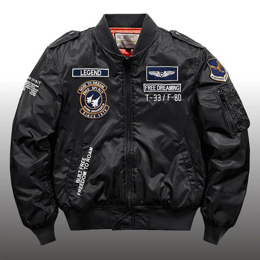 Black bomber jacket with patches and text on a white background