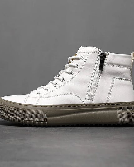 White high-top sneaker with a black zipper on a gray background